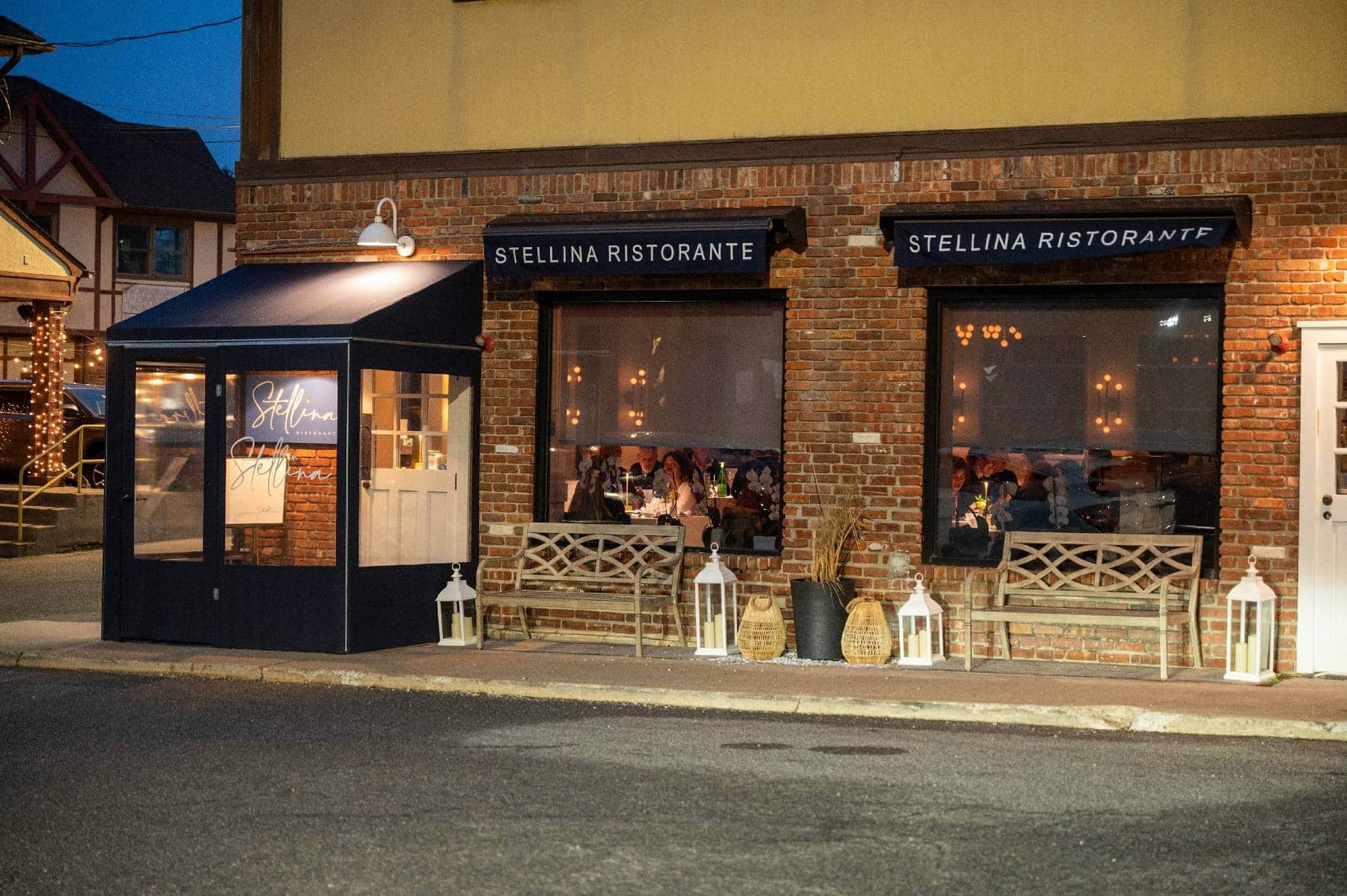The Stellina storefront at night